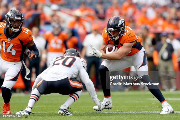Jeff Heuerman of the Denver Broncos tries to elude Prince Amukamara of the Chicago Bears at Empower Field at Mile High on September 15, 2019 in...