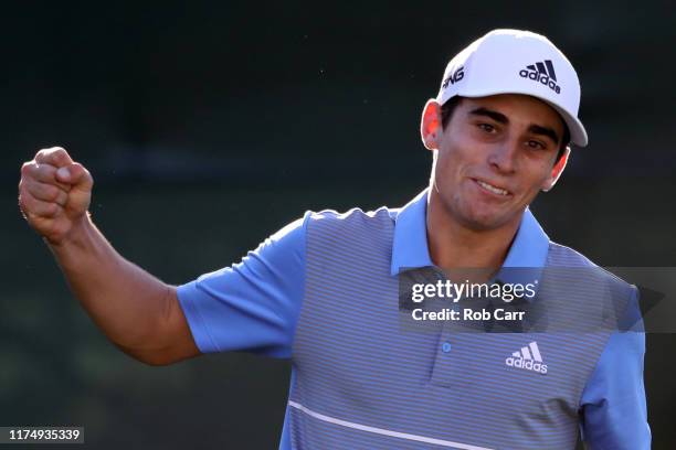 Joaquin Niemann of Chile celebrates a birdie putt on the 18th green to win A Military Tribute at The Greenbrier held at the Old White TPC course on...