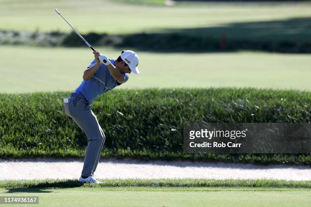 Joaquin Niemann of Chile hits his second shot to the 12th green during the final round of A Military Tribute at The Greenbrier held at the Old White...