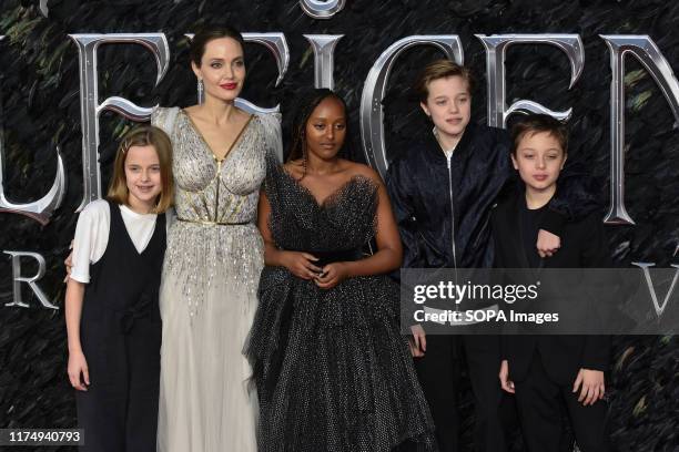 Vivienne Jolie-Pitt, Angelina Jolie, Zahara Jolie-Pitt, Shiloh Jolie-Pitt and Knox Leon Jolie-Pitt attend the Maleficent: Mistress of Evil European...