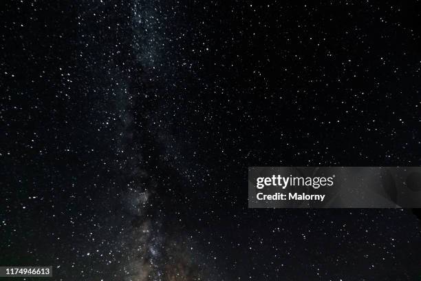 starry night sky. - astronomía fotografías e imágenes de stock