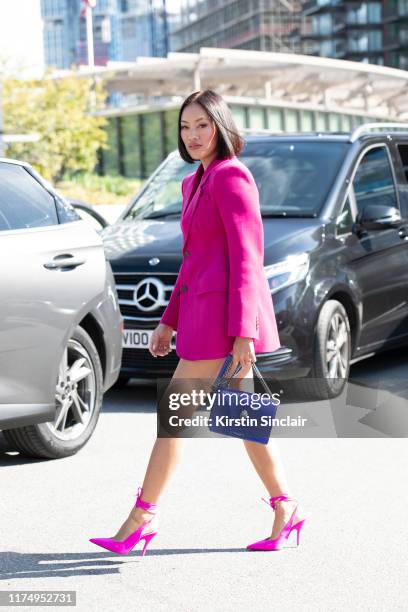 Tiffany Hsu wears The Attico shoes, Balenciaga jacket and a Kurt Geiger bag on September 15, 2019 in London, England.