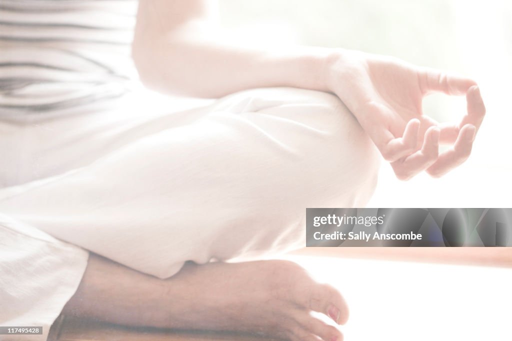 Young woman practicing yoga