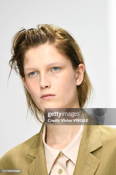 Model walks the runway at the Margaret Howell Ready to Wear Spring/Summer fashion show during London Fashion Week September 2019 on September 15,...