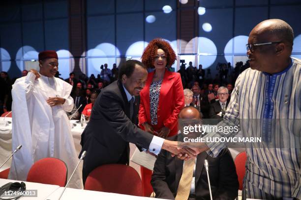 Niger president Mahamadou Issoufou, Cameroun president Paul Biya and his wife Chantal Biya, king Mswati III head of state of eSwatini and Burkina...