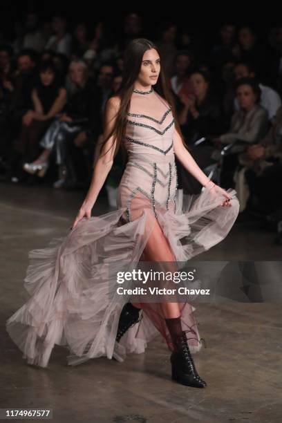 Macarena Achaga walks the runway during the Alexia Ulibarri show as part of the Mercedez-Benz Fashion Week Mexico Spring/Summer 2020 - Day 2 at...