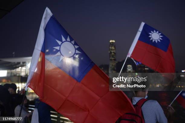 People are seen holding up a Taiwan National Flag in Hong Kong on October 10 Today Taiwan Celebrates it National Day