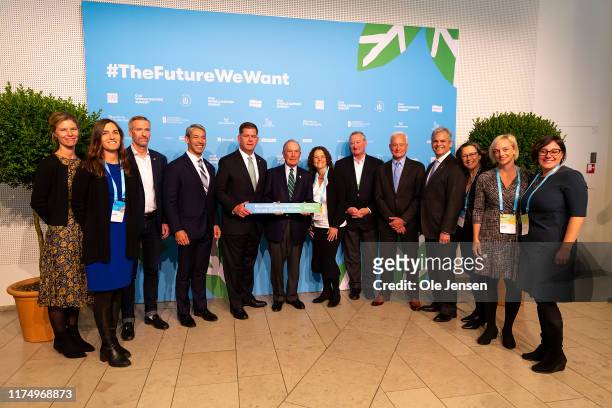 Mayors participating in the C40 World Mayors Summit and their associates pose for photo at the C40 World Mayors Summit on October 10, 2019 in...