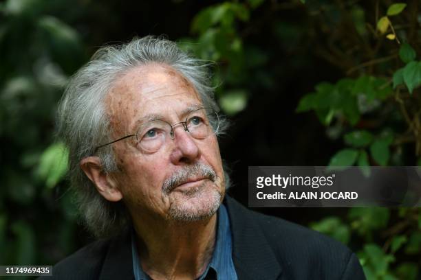 Austrian writer Peter Handke poses in Chaville, in the Paris surburbs, on October 10, 2019 after he was awarded with the 2019 Nobel Literature Prize....