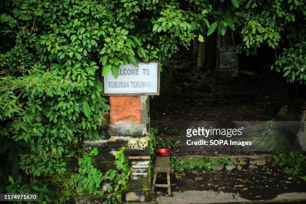Entrance to the tomb of the Trunyan Village community, Bali. Trunyan is a village located in Kintamani District, Bangli Regency, Bali, Indonesia....