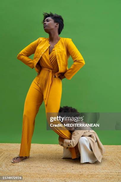 fashion model mother and daughter hug - model crouching stock pictures, royalty-free photos & images