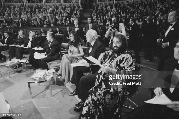 The judges of the the 26th edition of the Miss World pageant, Miss World 1976, at the Royal Albert Hall, London, UK, 19th November 1976: including,...