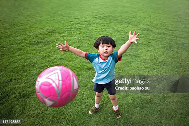 Throwing Ball Kids Photos and Premium High Res Pictures - Getty Images