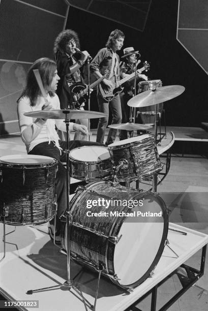 English glam rock group T Rex featuring, from left, drummer Bill Legend, singer & guitarist Marc Bolan , bassist Steve Currie and percussionist...