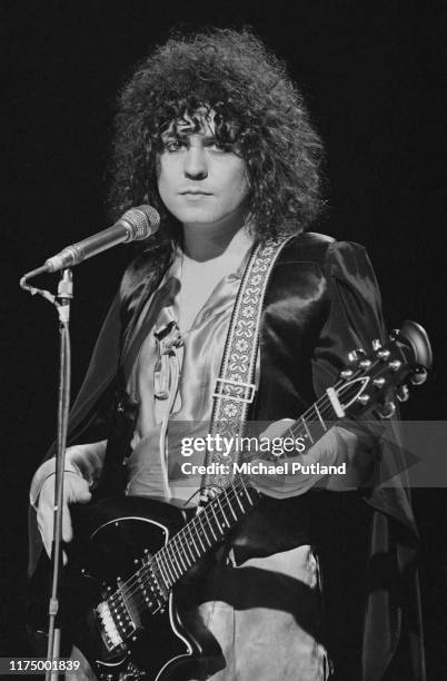Singer and guitarist Marc Bolan of English glam rock group T Rex posed during a performance of the band's new single 'The Groover' on the BBC music...