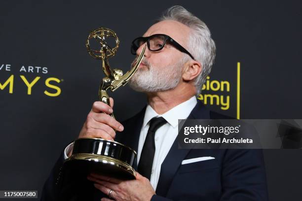 Bradley Whitford poses for photos in the press room for the 2019 Creative Arts Emmy Awards on September 15, 2019 in Los Angeles, California.