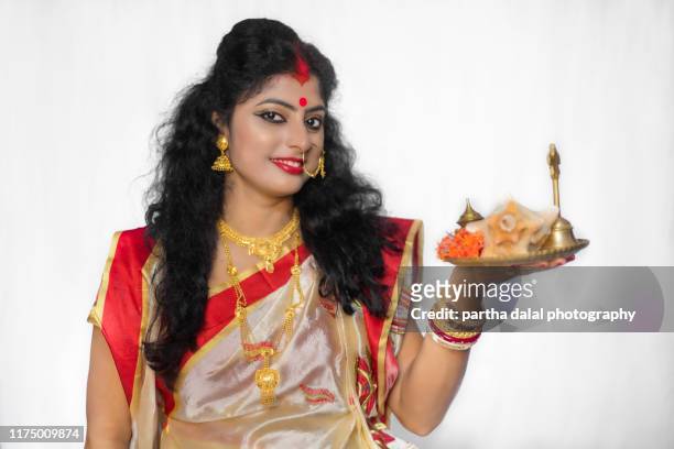 indian women with puja thali - durga puja stock pictures, royalty-free photos & images