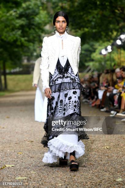 Model walks the runway at the Erdem show during London Fashion Week September 2019 at Grays Inn Gardens on September 16, 2019 in London, England.