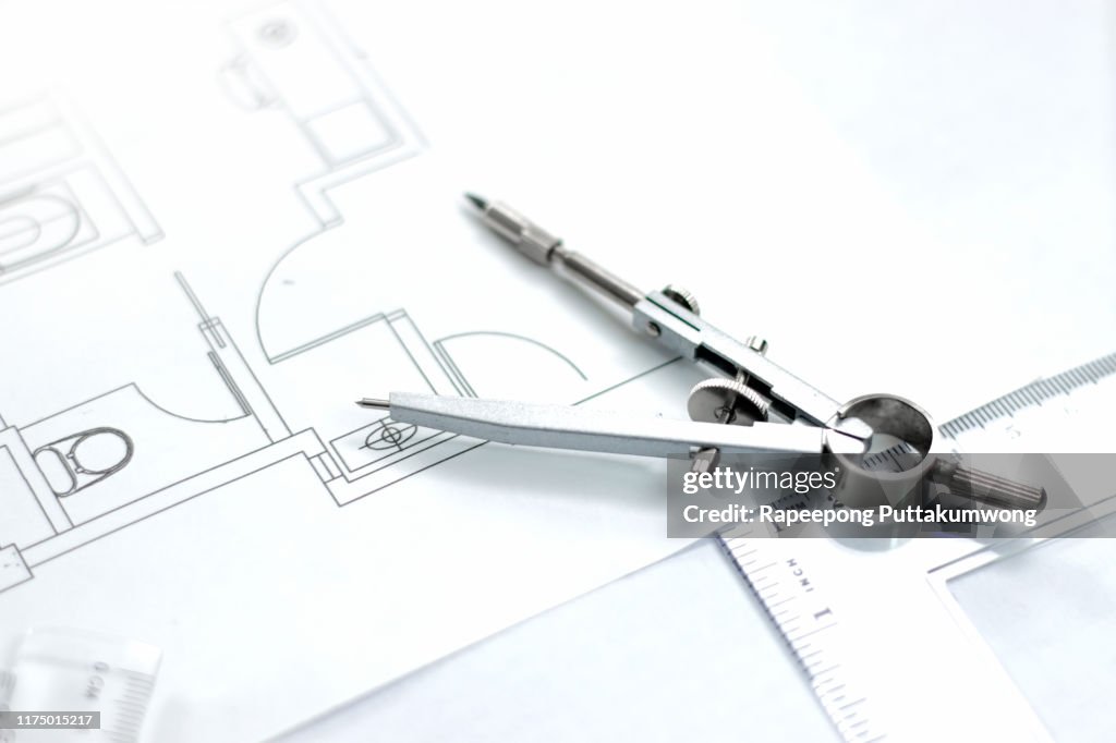Workplace of architect. architectural plan, compass drawing tool, Engineering tools