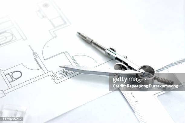 workplace of architect. architectural plan, compass drawing tool, engineering tools - drawing compass fotografías e imágenes de stock