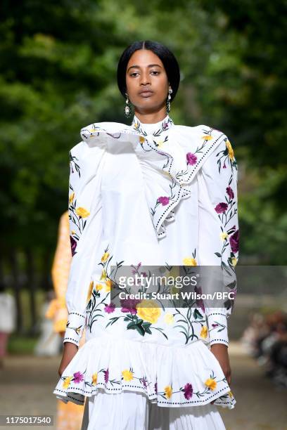 Model walks the runway at the Erdem show during London Fashion Week September 2019 at Grays Inn Gardens on September 16, 2019 in London, England.