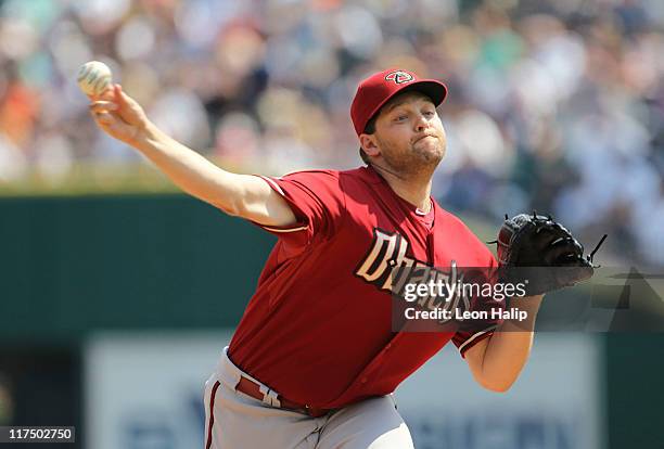 Aaron Heilman of the Arizona Diamondbacks pitches in the eighth inning of the game against the Arizona Diamondbacks at Comerica Park on June 26, 2011...