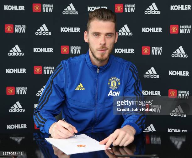 David de Gea of Manchester United poses after signing a new contract with the club at Aon Training Complex on September 16, 2019 in Manchester,...