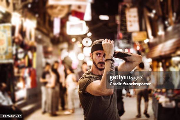 serious pensive man standing in kathmandu - nepal city stock pictures, royalty-free photos & images