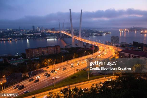 the golden bridge in vladivostok - vladivostok stock pictures, royalty-free photos & images