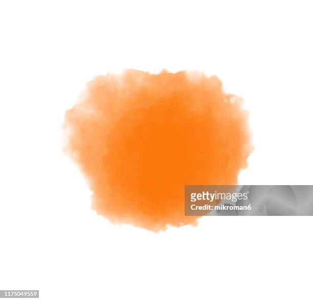 watercolor paint on paper mixed to create a watercolor effect illustration - orange splash bildbanksfoton och bilder