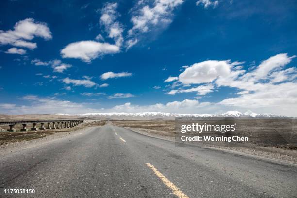 road and landscape in qinghai,china - mus stock pictures, royalty-free photos & images