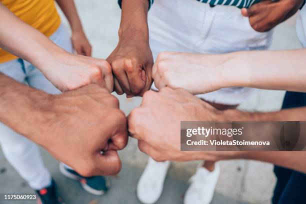 group of friends showing unity - sea of hands stock pictures, royalty-free photos & images