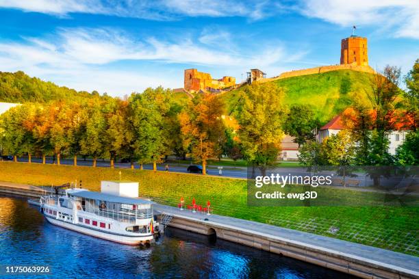 wilia river and gediminas tower on the hill, vilnius, lithuania - vilnius stock pictures, royalty-free photos & images