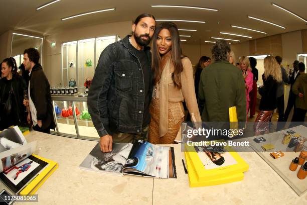 Ben Gorham and Naomi Campbell attend the Craig McDean x BYREDO cocktail party at the BYREDO Lexington Street store on September 16, 2019 in London,...