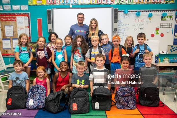 Dale Earnhardt Jr. And his wife Amy surprise students for the Vera Bradley x Blessings In A Backpack Event at Shepherd Elementary on September 16,...