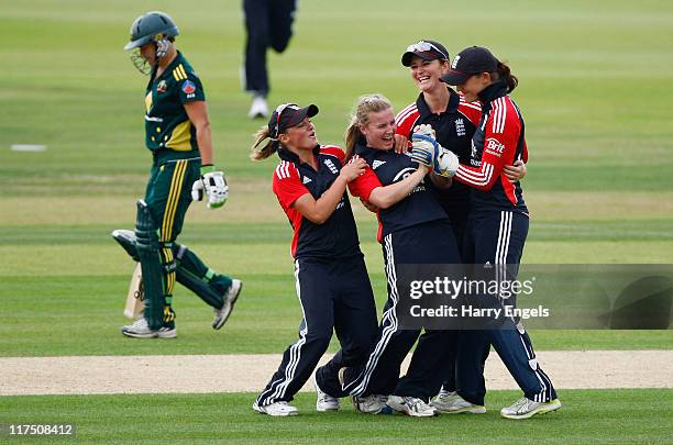 England players celebrate after Holly Colvin took a wicket during the NatWest Women's Twenty20 Quadrangular Series match between England and...