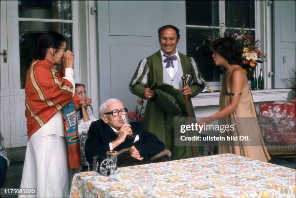 Charlie Chaplin with his wife Oona and his daughter Annette, 1977