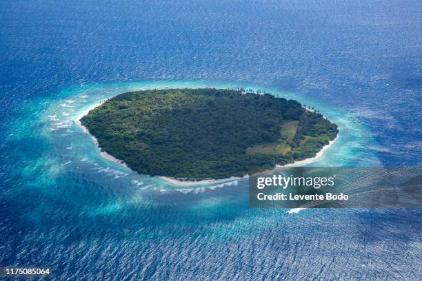 aerial photo of beautiful paradise maldives tropical beach on island. summer and travel vacation concept. - private island stock-fotos und bilder