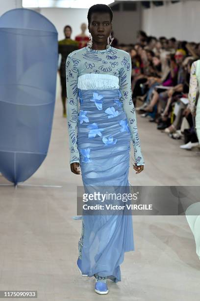 Model walks the runway at the Richard Malone Ready to Wear Spring/Summer 2020 fashion show during London Fashion Week September 2019 on September 16,...