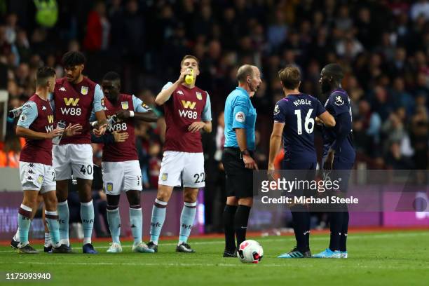 West Ham United Captain Mark Noble questions Referee Michael Dean as he sends off Arthur Masuaku of West Ham United during the Premier League match...