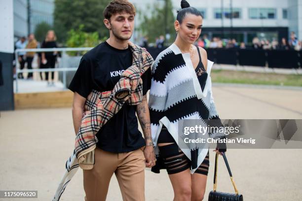 Anwar Hadid and Dua Lipa is seen outside Burberry during London Fashion Week September 2019 on September 16, 2019 in London, England.