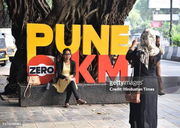 Life around Zero Stone in day time on October 5, 2019 in Pune, India. Punes Zero Stone, a heritage landmark restored and unveiled by the Pune...