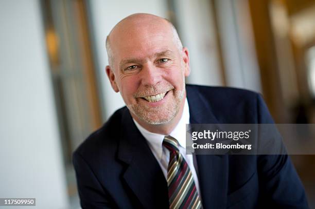 Greg Gianforte, chairman and chief executive officer for RightNow Technologies Inc., stands for a photograph before taking part in a Bloomberg via...