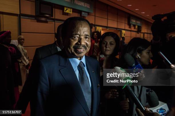 Cameroon's President Paul Biya answers journalists' questions during the fundraising day at the sixth World Fund Conference in Lyon, France, on 10...