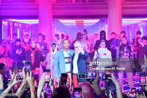 Lewis Hamilton and the fashion designer Tommy Hilfiger pose during the Fall 2019 Tommy x Lewis Milan presentation during the Milan Fashion Week...