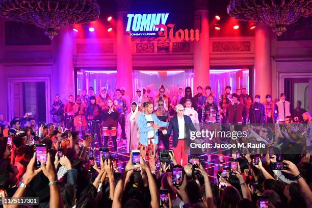 Lewis Hamilton and the fashion designer Tommy Hilfiger pose during the Fall 2019 Tommy x Lewis Milan presentation during the Milan Fashion Week...