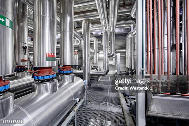 pipeworks with insulation in a technical room - district heating plant stock pictures, royalty-free photos & images