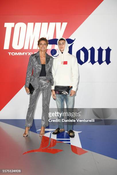 Martina Colombari and Achille Costacurta attend the Fall 2019 Tommy x Lewis Milan presentation during the Milan Fashion Week Spring/Summer 2020 on...