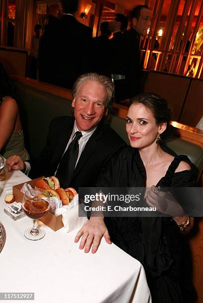 Bill Maher and Winona Ryder during 2006 Vanity Fair Oscar Party Hosted by Graydon Carter at Morton's in Beverly Hills, California, United States.