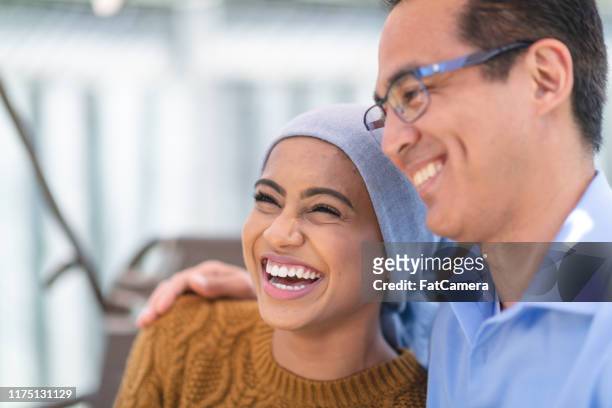 young woman with cancer spends precious time with her father - cancer patient with family stock pictures, royalty-free photos & images